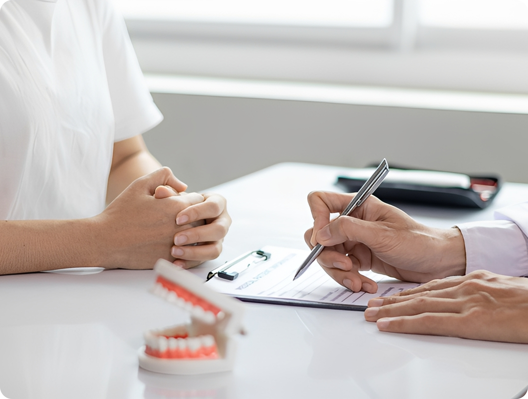 Dentist explaining treatment plan